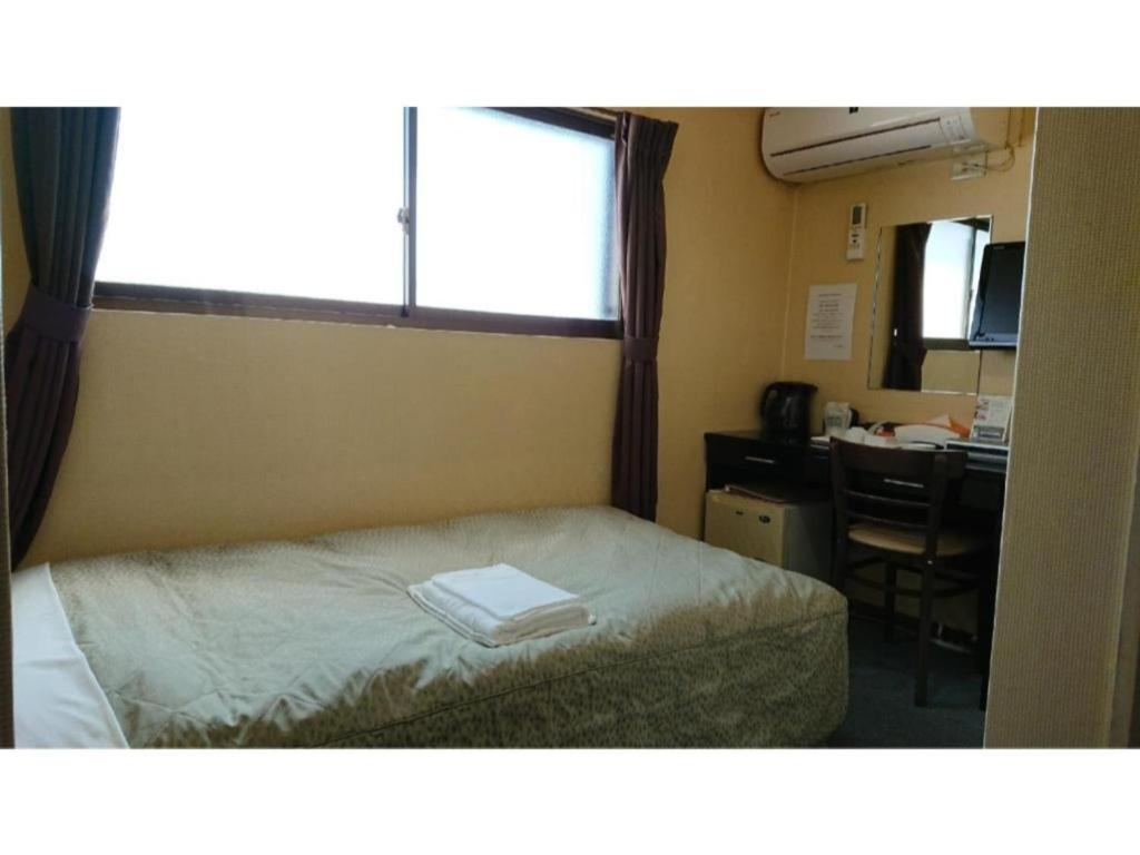 Krevet ili kreveti u jedinici u objektu City Inn Nishi Tanabe / Vacation STAY 78534