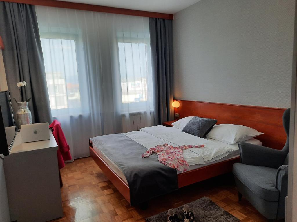 Krevet ili kreveti u jedinici u okviru objekta Rooms Vodisek - Depandansa Capodistria Boutique hotela