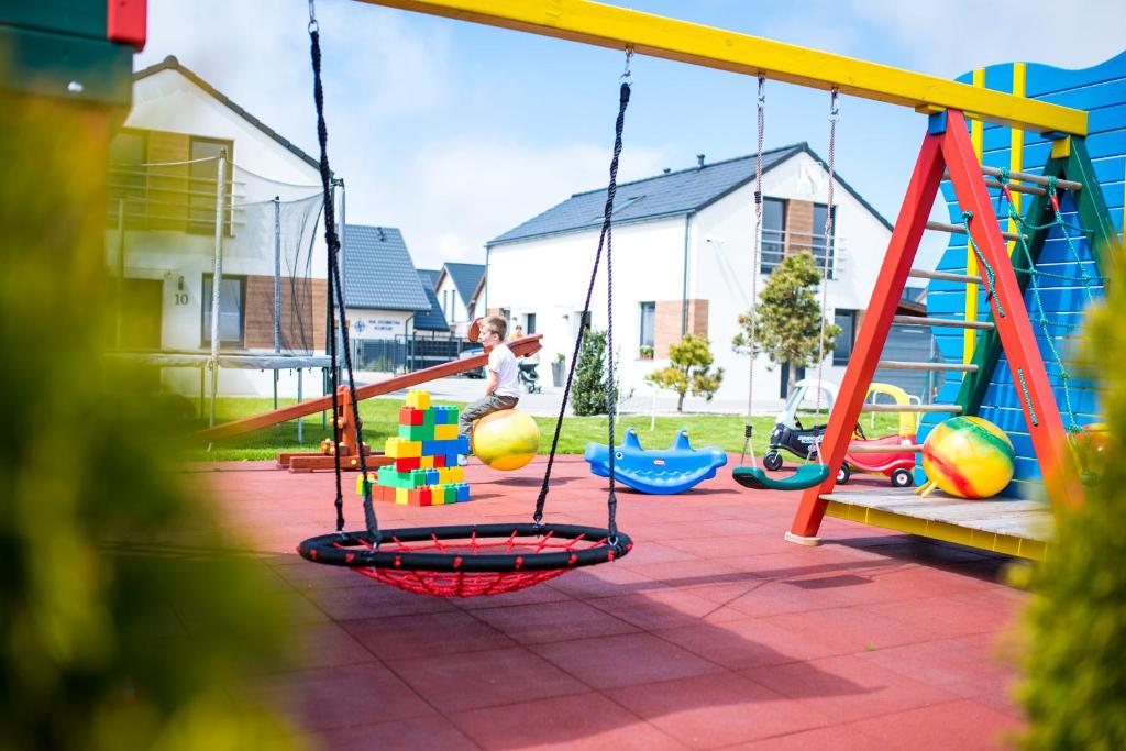 Aire de jeux pour enfants de l'établissement Apartamenty Rodzinne Słoneczny Zakątek