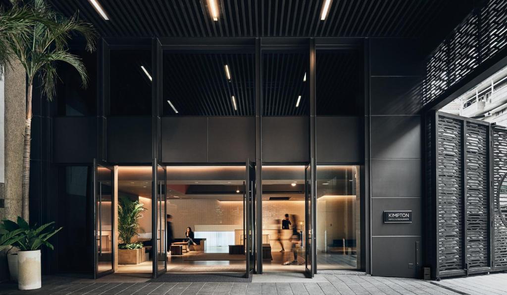 an entrance to a building with glass doors at Kimpton Da An Taipei- an IHG Hotel in Taipei