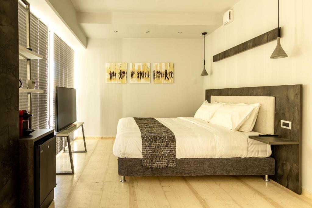 Cama ou camas em um quarto em BOUTiE Premium, a KalamataStay Property