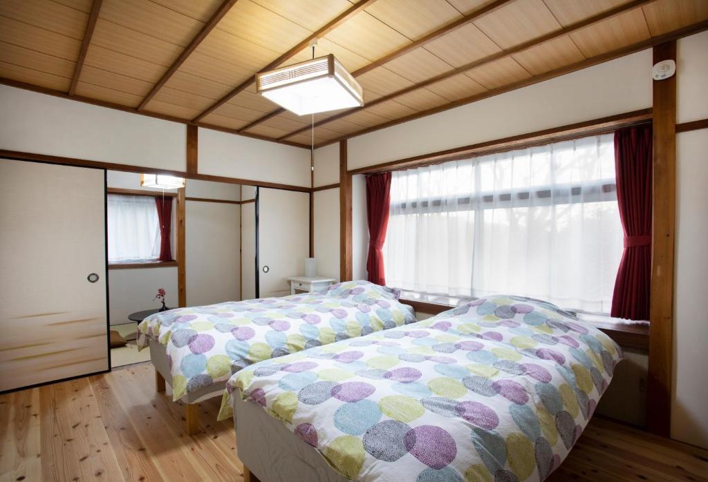 Llit o llits en una habitació de Kameoka - House - Vacation STAY 84269