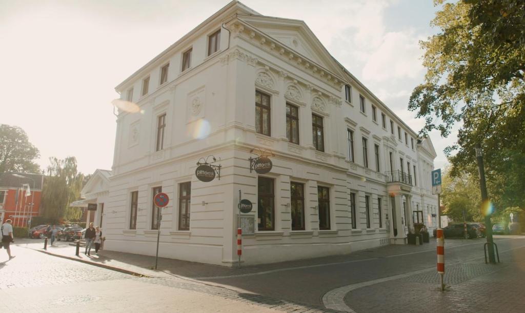 Asiakkaita majoituspaikassa Hotel Am Schloss Aurich