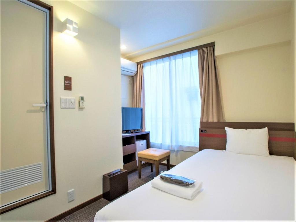 SHIN YOKOHAMA SK HOTEL - Non Smoking - Vacation STAY 86092 में एक कमरे में एक या कई बेड