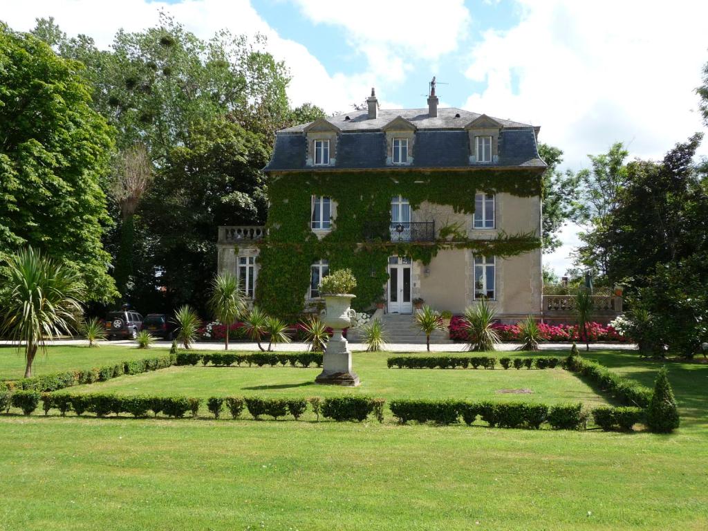 Un jardín fuera de Manoir de la Marjolaine