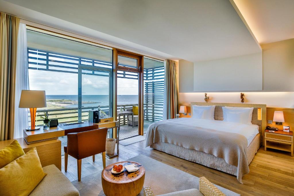 Katil atau katil-katil dalam bilik di BUDERSAND Hotel - Golf & Spa - Sylt