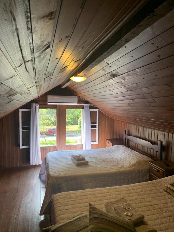 Una cama o camas en una habitación de HMG Morada & Chalet - Centro histórico