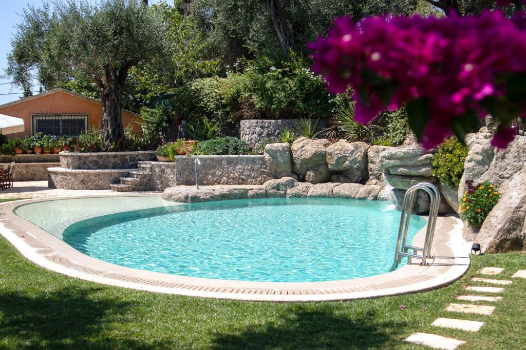 The swimming pool at or close to The Red Bougainvillea Apartments