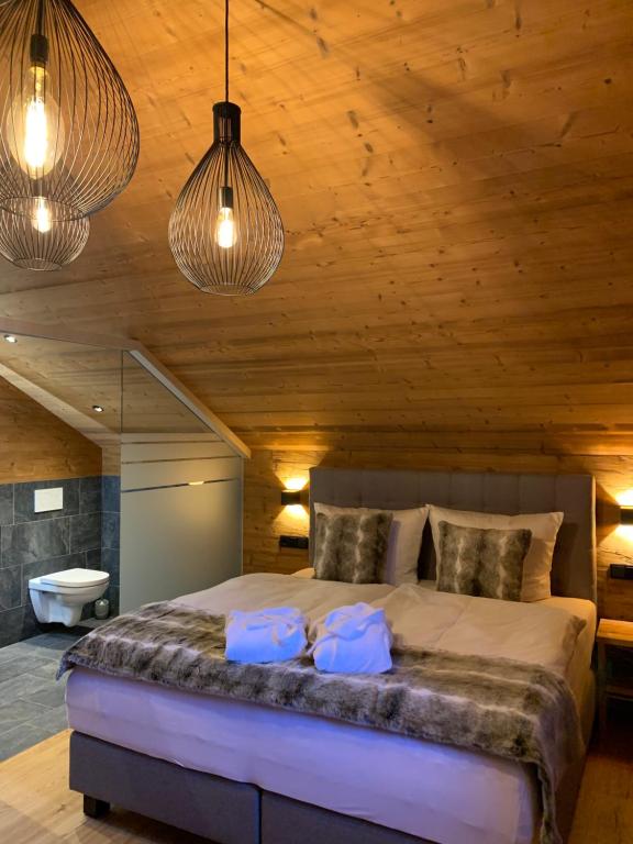 Chalet RelaxAlp Garfrescha में एक कमरे में एक या कई बेड