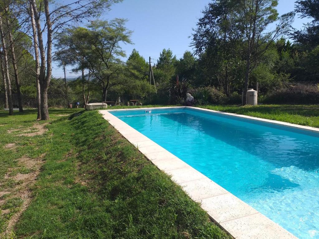 The swimming pool at or close to Hostal El Algarrobo