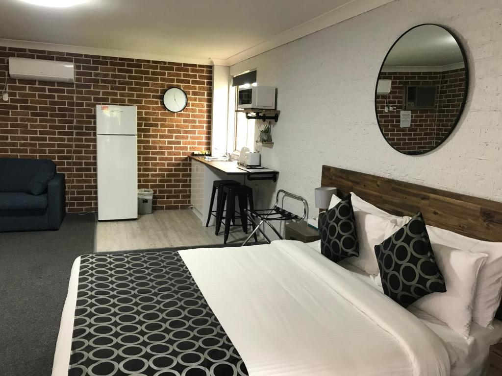 Krevet ili kreveti u jedinici u objektu Coffs Shearwater Motel