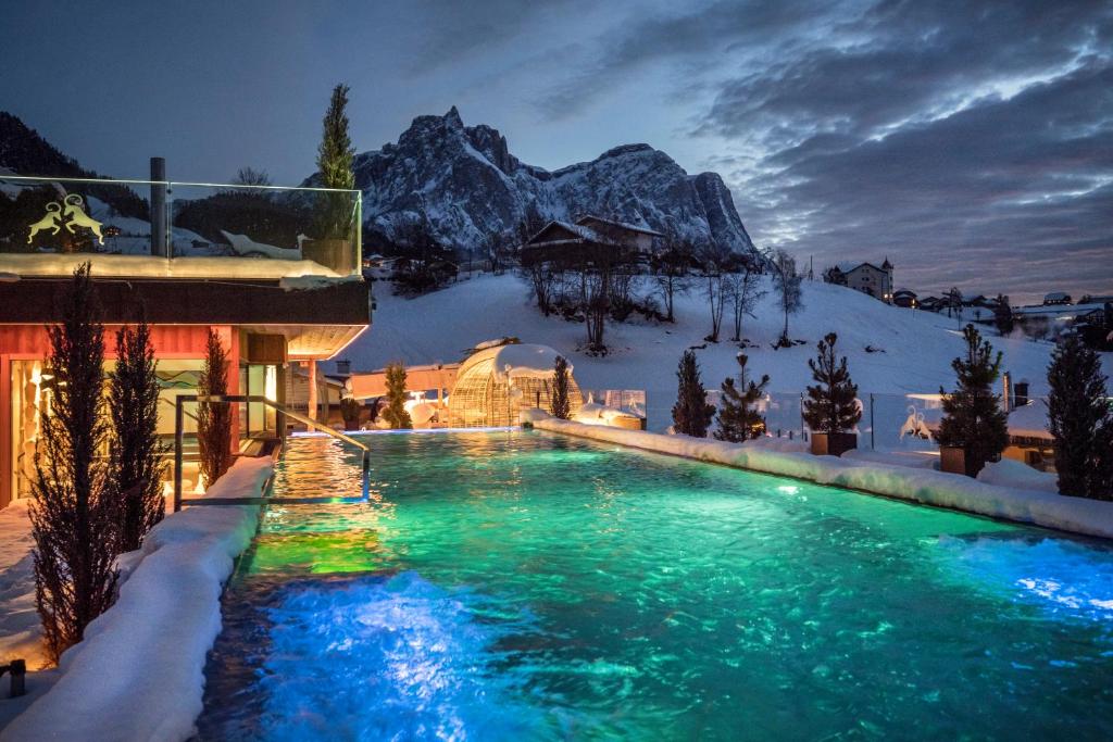 The swimming pool at or close to ABINEA Dolomiti Romantic SPA