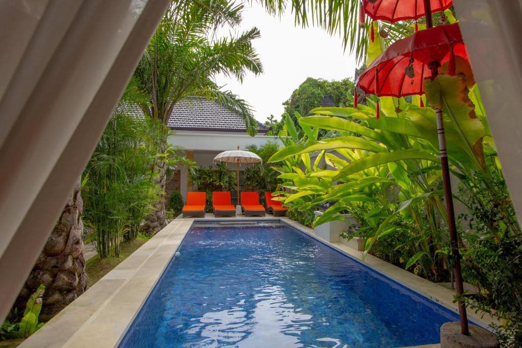 The swimming pool at or close to Bali Komang Guest House Sanur