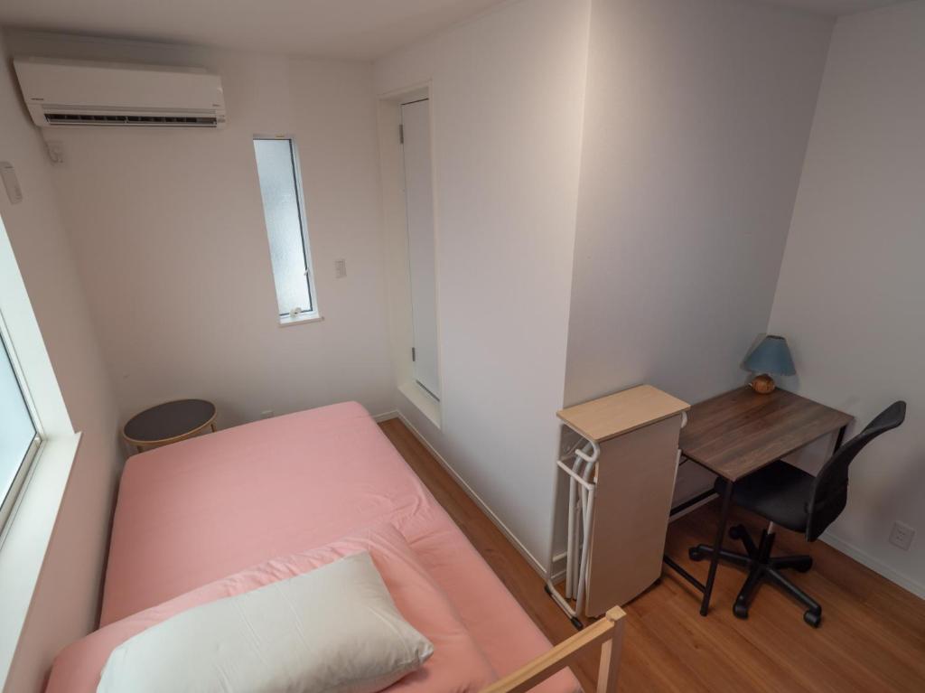 מיטה או מיטות בחדר ב-Kamakura International House Double Room w Shower Toilette - Vacation STAY 11408