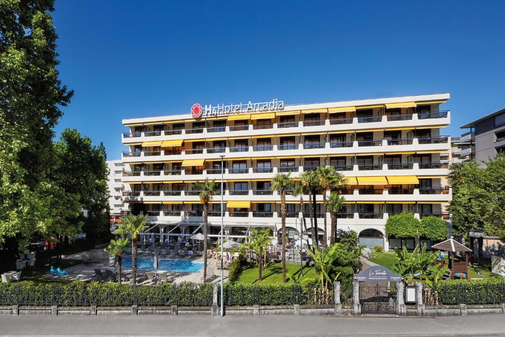 Πισίνα στο ή κοντά στο H4 Hotel Arcadia Locarno