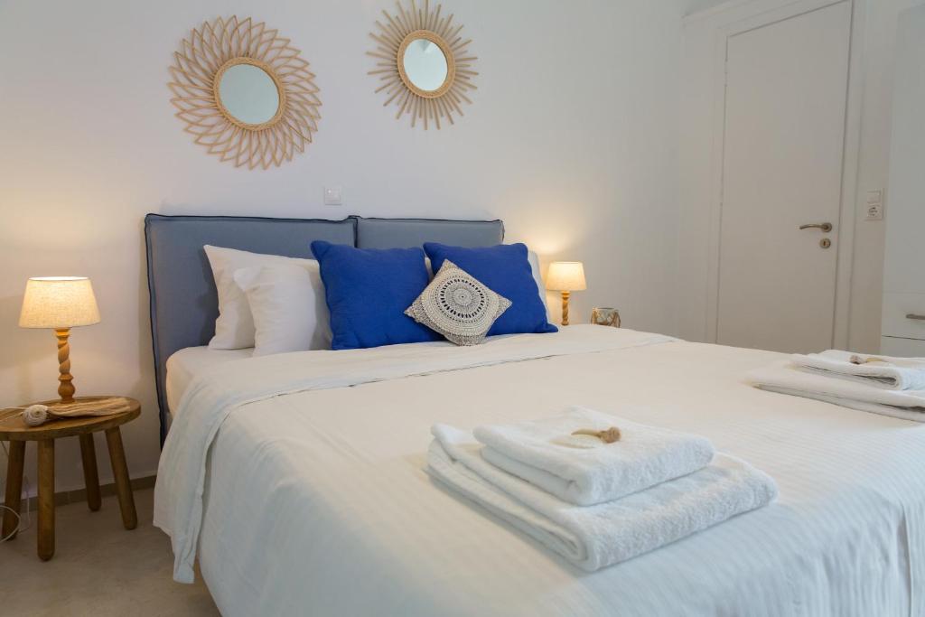 A bed or beds in a room at Bay View Villas