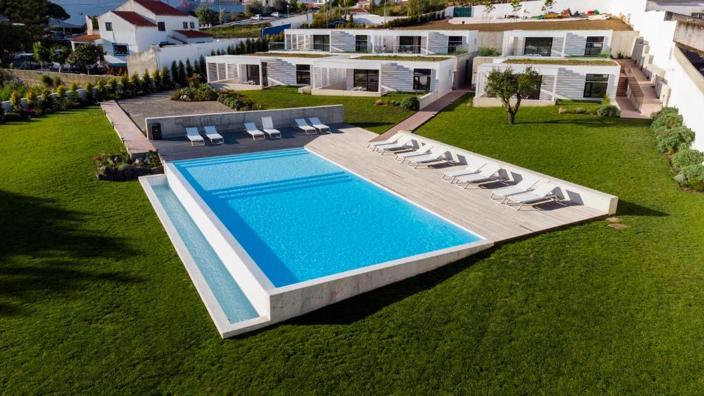 an overhead view of a swimming pool in a house at Ericeira Prime Villas in Ericeira