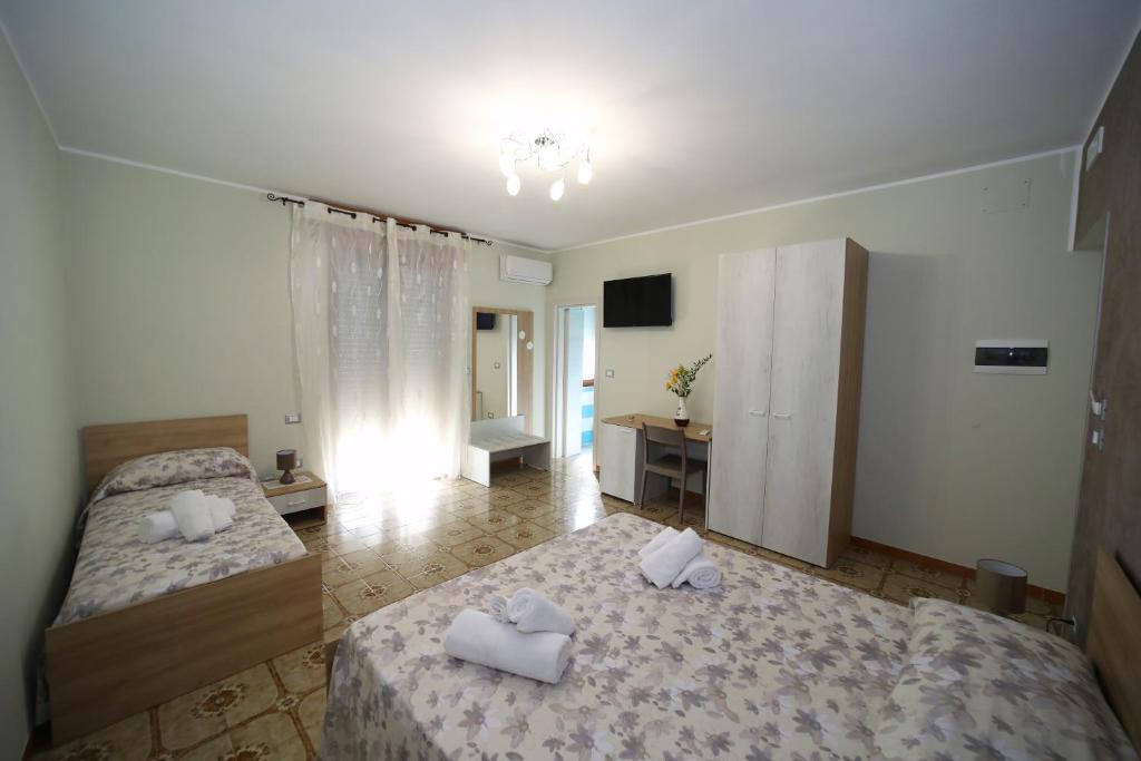 Vuode tai vuoteita majoituspaikassa B&B Le Gorgonie