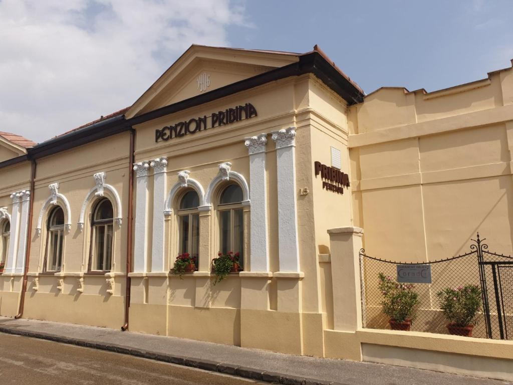 a building on the side of a street at Pribina Penzión in Nitra