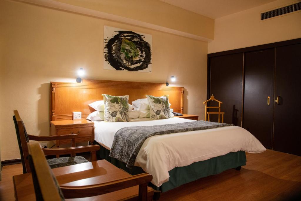 เตียงในห้องที่ BON Hotel Bloemfontein Central