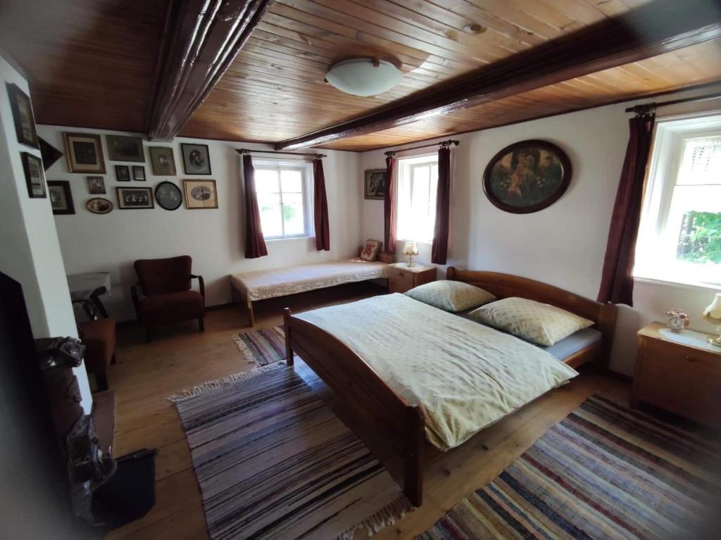 Cama ou camas em um quarto em Cafe Nostalgie čtyřlůžkový apartmán