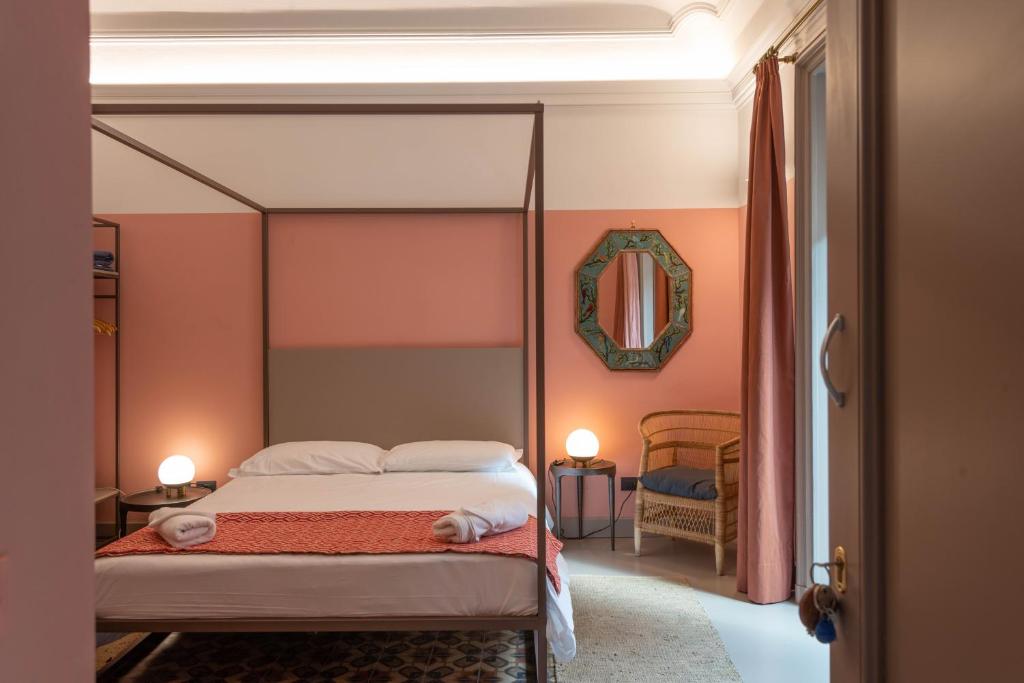 Cama ou camas em um quarto em Palazzo Scammacca