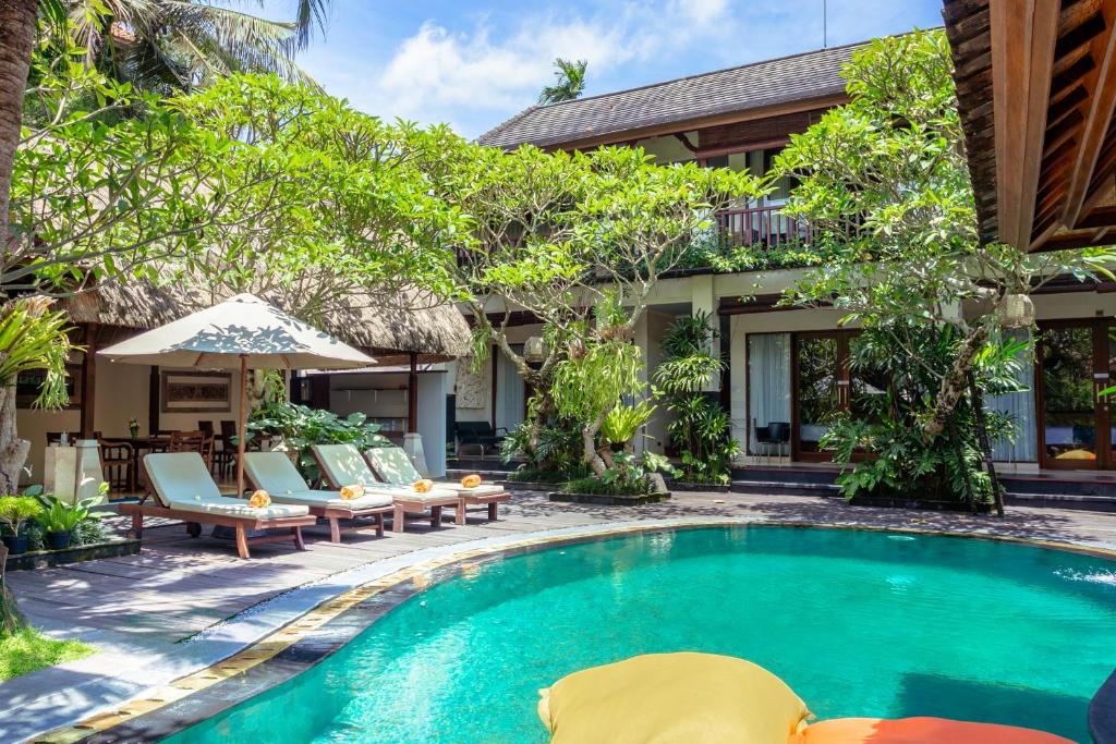 Majoituspaikassa Lumbung Sari Ubud Hotel - CHSE Certified tai sen lähellä sijaitseva uima-allas