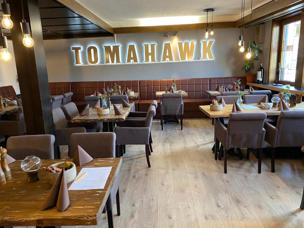 Restoranas ar kita vieta pavalgyti apgyvendinimo įstaigoje Hotel Restaurant Tomahawk