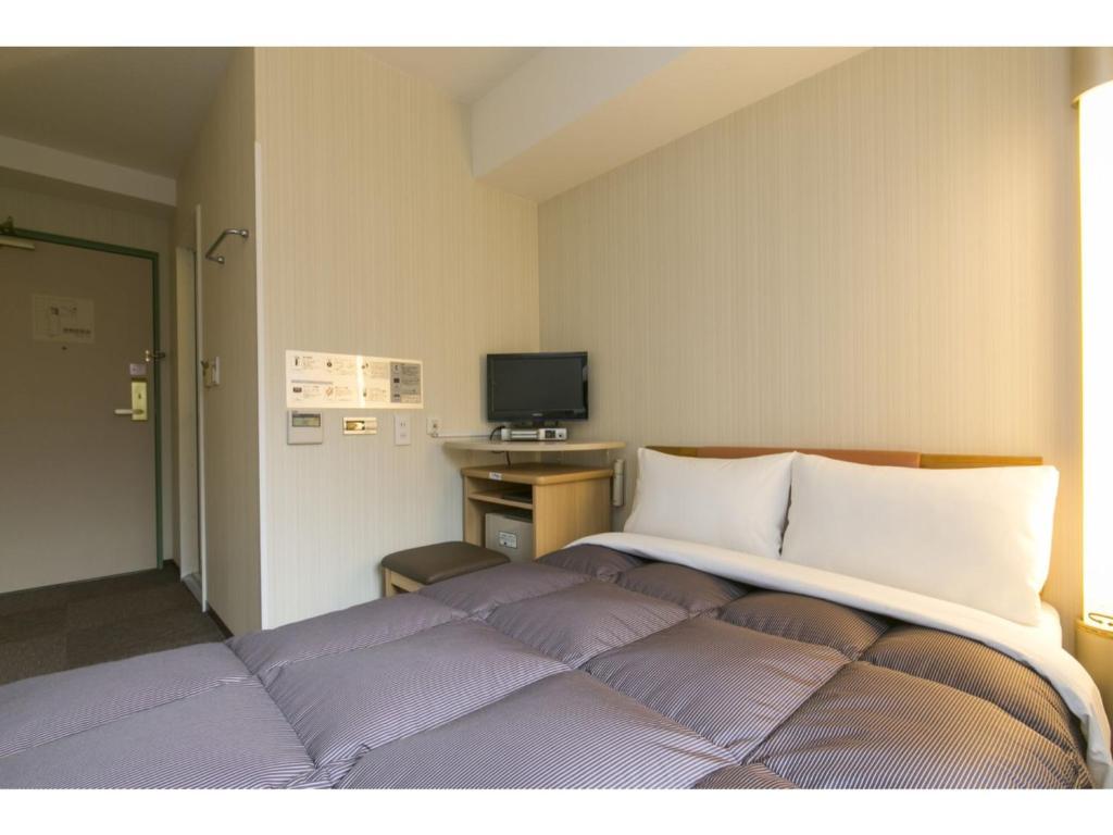 โทรทัศน์และ/หรือระบบความบันเทิงของ R&B Hotel Kumagaya Ekimae - Vacation STAY 40478v