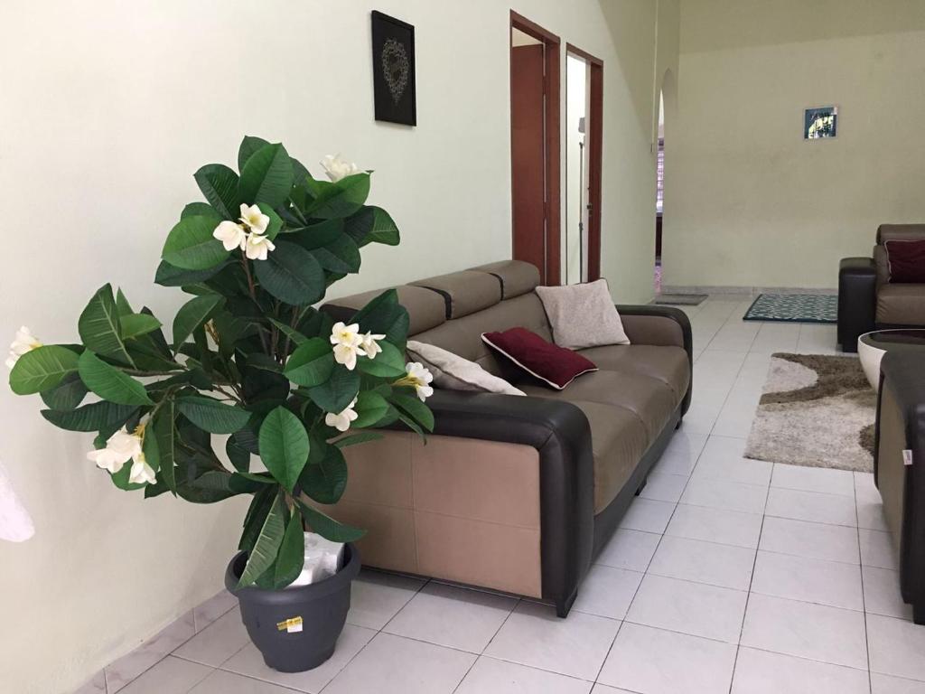 Un lugar para sentarse en Taiping Desa Jana Home Stay