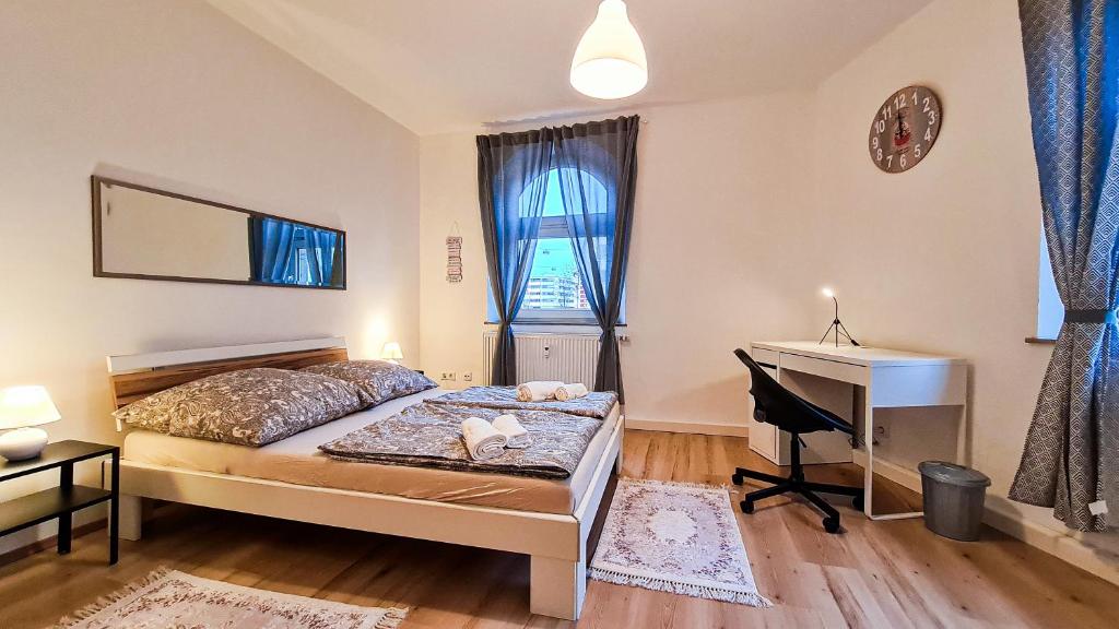 En eller flere senger på et rom på Luxuriöses Apartment im Zentrum von Nürnberg