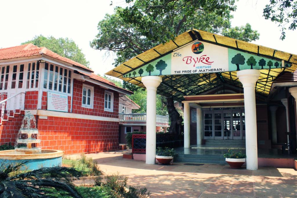 a building with a pavilion in front of a building at The Byke Heritage Adventure Park & Resort, Matheran in Matheran