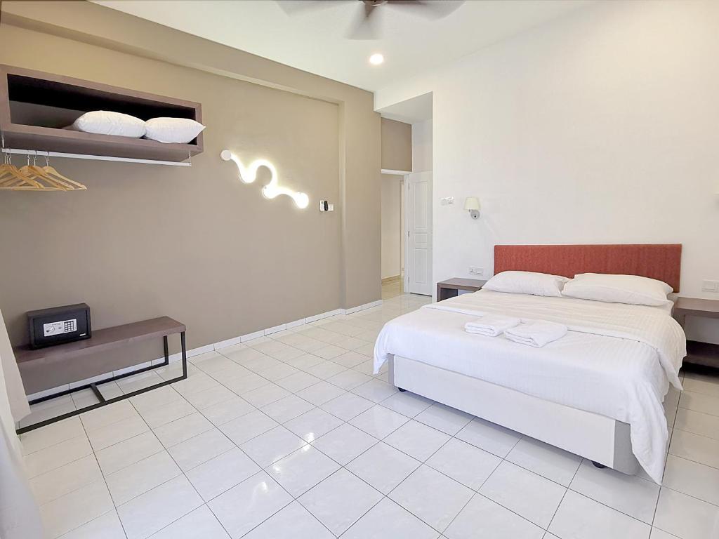 Tempat tidur dalam kamar di 3 Concordia @ Gurney