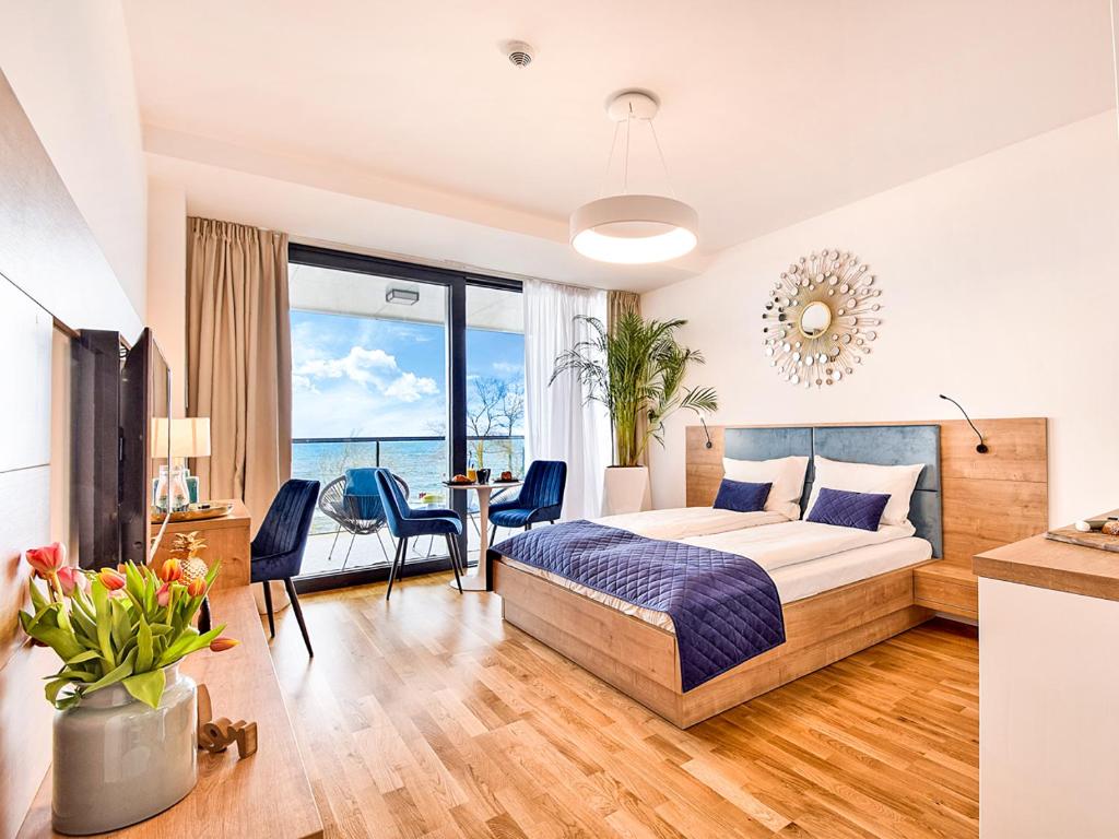 Cama ou camas em um quarto em NORTH Apartments, SeaView Seaside Park