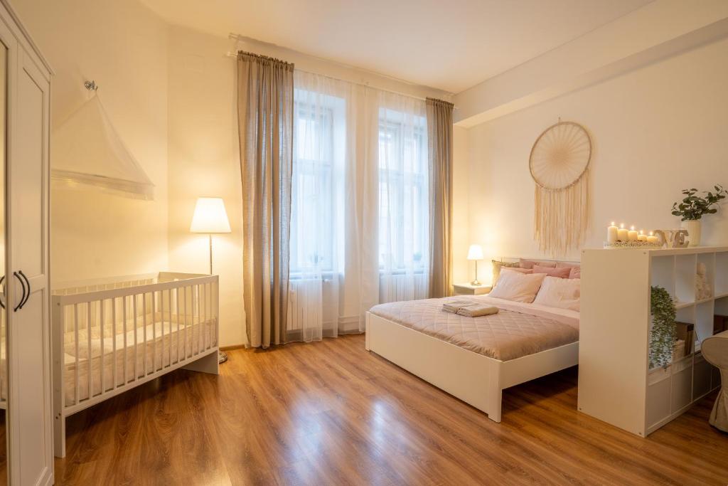 Posteľ alebo postele v izbe v ubytovaní FAMILY Apartment OSTRAVA