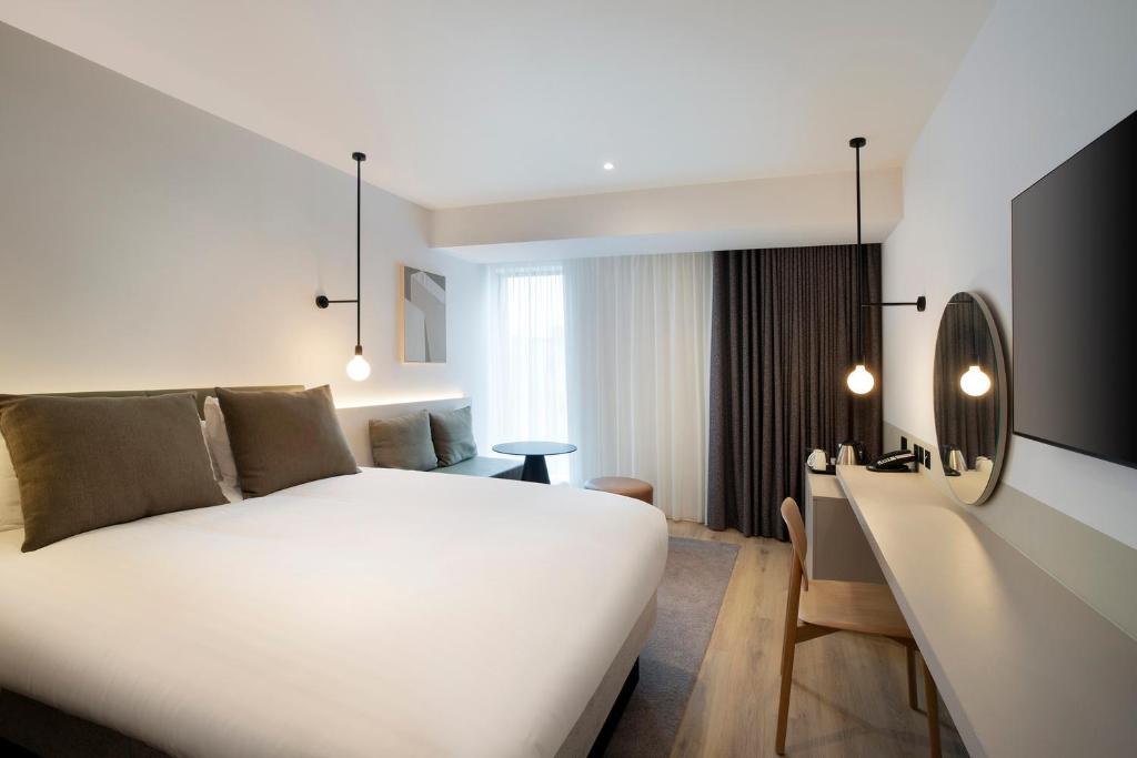 Voodi või voodid majutusasutuse Leonardo Hotel Manchester Piccadilly toas