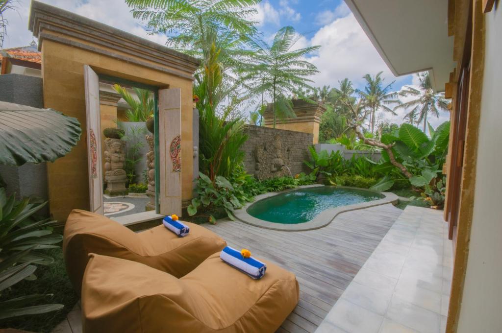 Govala Ubud Villas & SPA में या उसके करीब स्विमिंग पूल