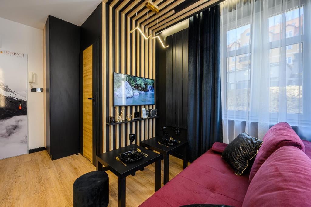 A television and/or entertainment centre at KarPatti Apartment