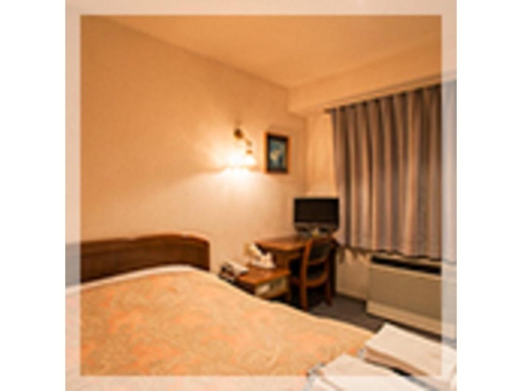 Famy Inn Makuhari - Vacation STAY 16040v房間的床