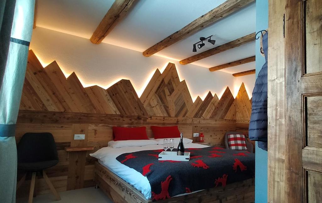 Tempat tidur dalam kamar di B&B Le Fió