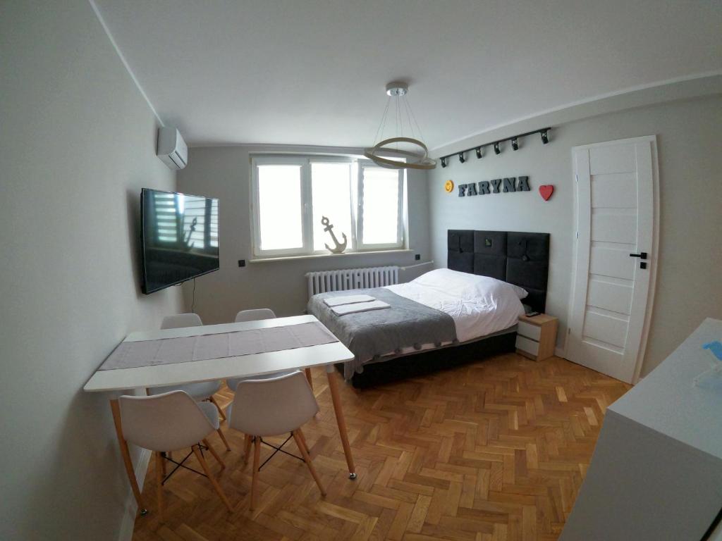 Krevet ili kreveti u jedinici u objektu Faryna Apartament