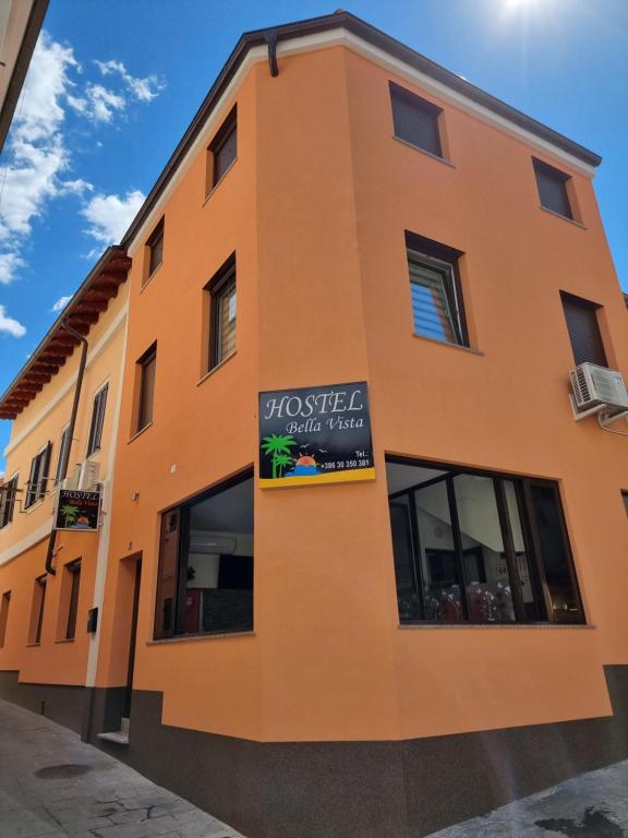 a building with a sign on the side of it at Hostel BellaVista in Koper