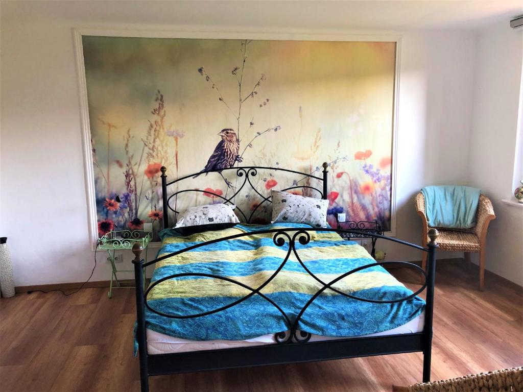 Una cama o camas en una habitación de Ferienwohnung "Frieda"