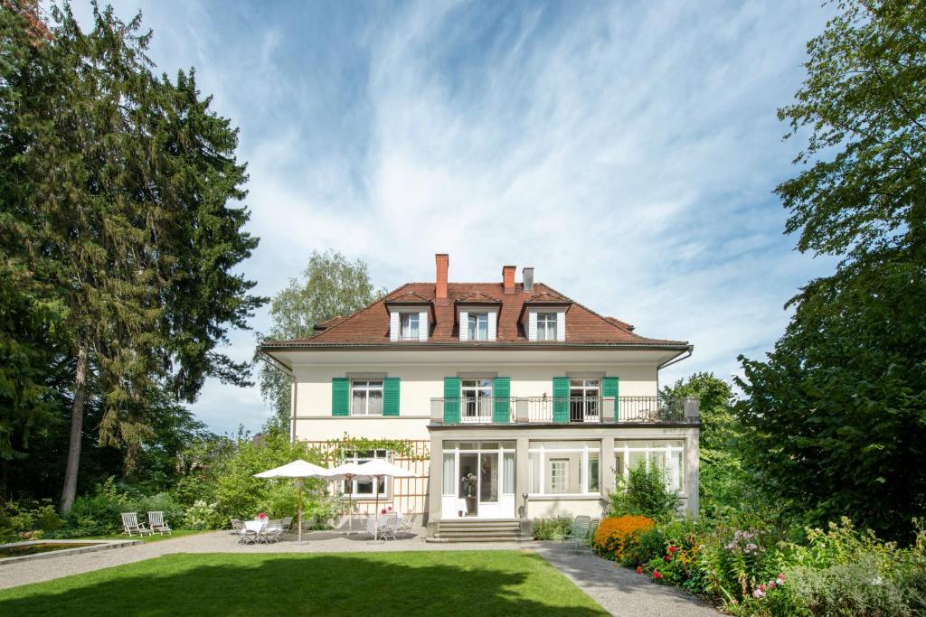 Signau House & Garden Boutique Hotel Zürich के बाहर एक बगीचा