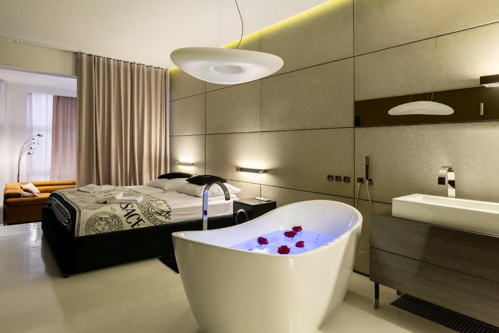 Katil atau katil-katil dalam bilik di Apartament z jacuzzi City Life Centrum