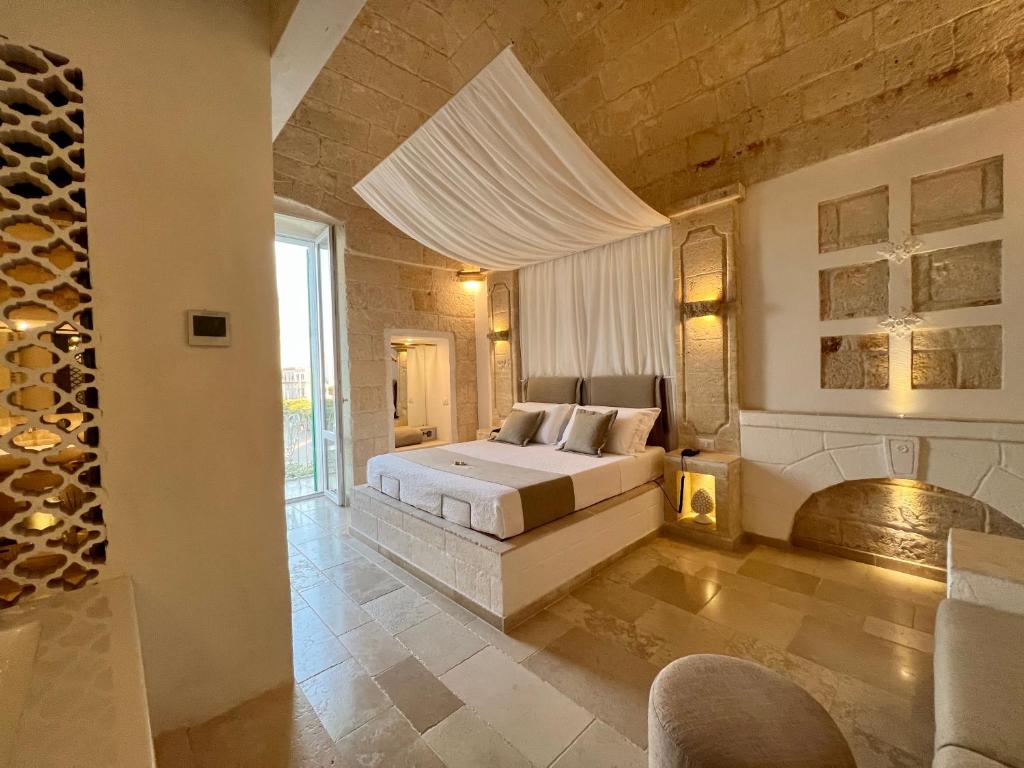 Ліжко або ліжка в номері Vittorio Emanuele Charming Suites