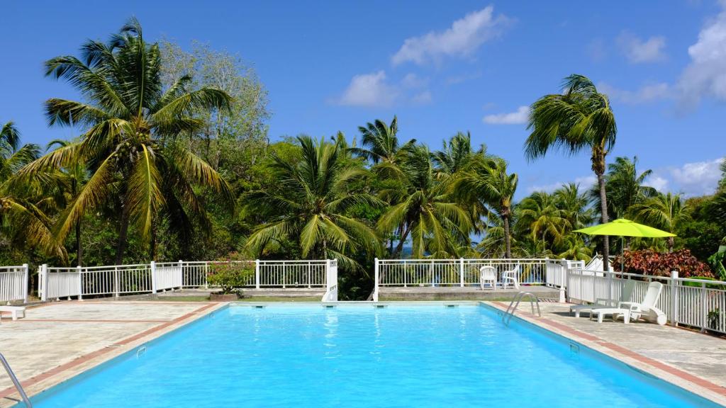 Piscina de la sau aproape de Imperatrice Village - Résidence sur la plage