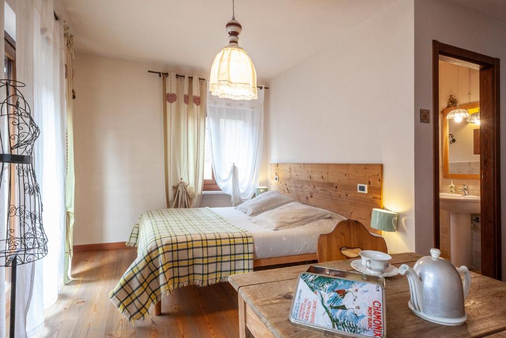 Postelja oz. postelje v sobi nastanitve Maison Le Champ B&B Questa casa non è un albergo