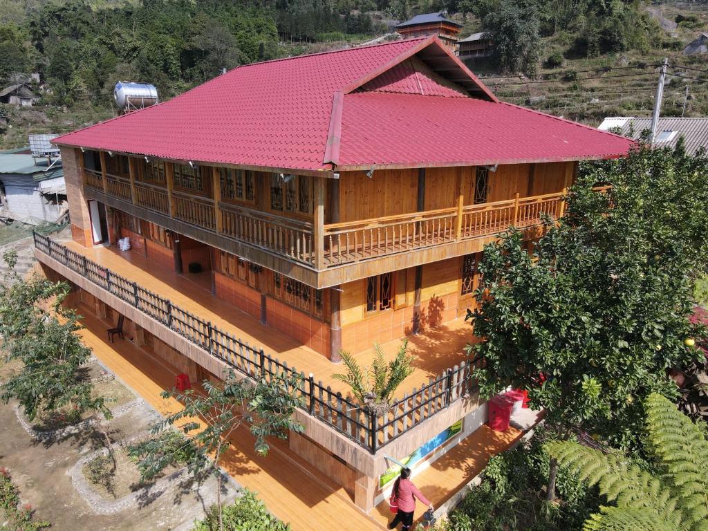 an overhead view of a building with a red roof at Muong Hoa Hmong Homestay in Sa Pa