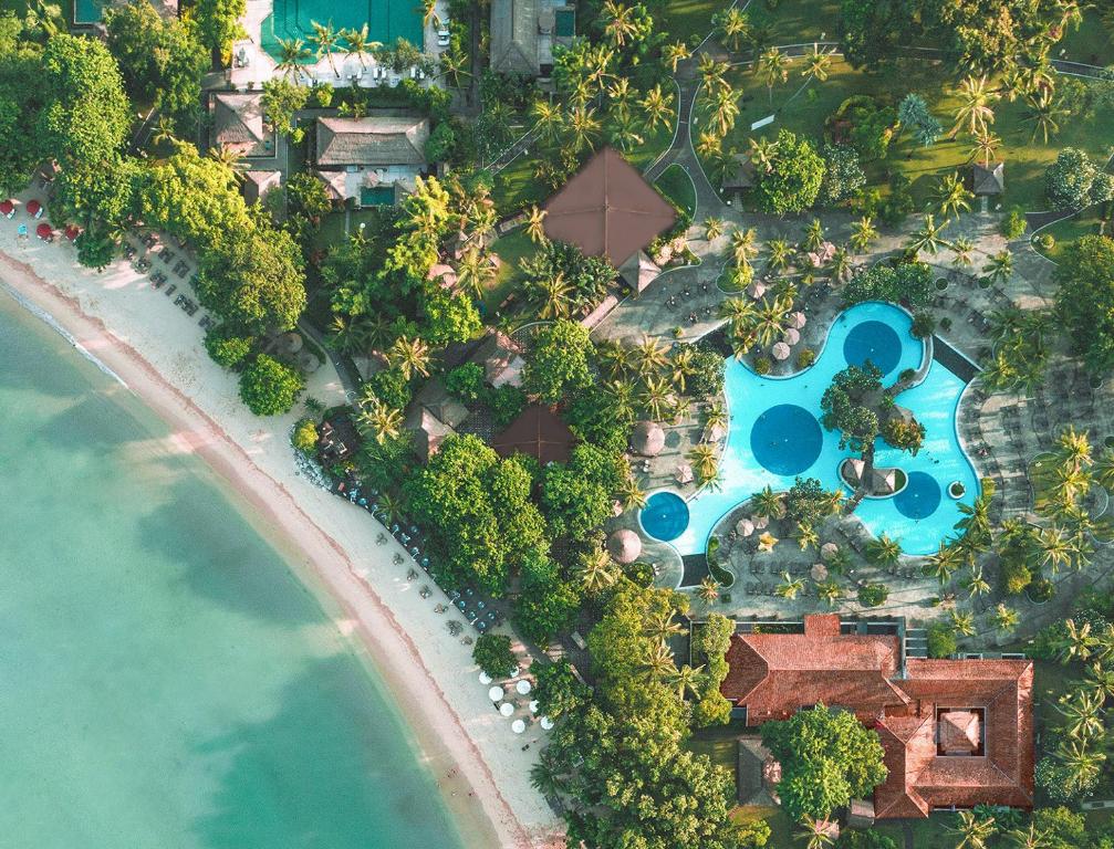 an aerial view of a resort next to the ocean at Meliá Bali in Nusa Dua